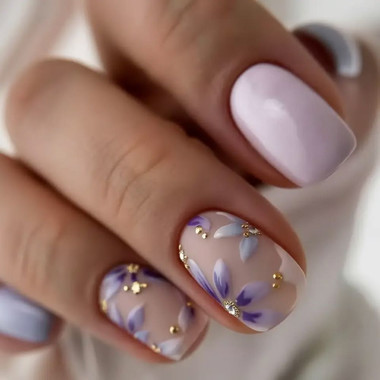 Delicate manicure with purple flowers