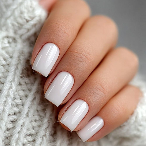 White glossy manicure on short nails