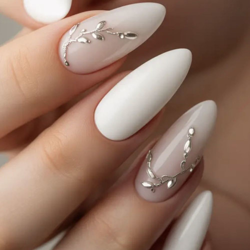 White manicure with silver decor